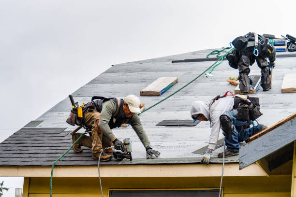 Professional Roofing technician working in Babson Park, MA
